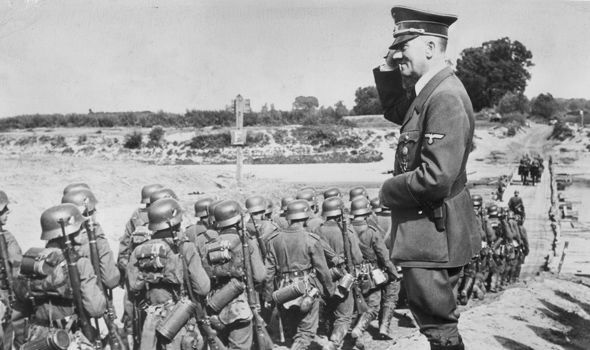 Adolf Hitler saluting troops